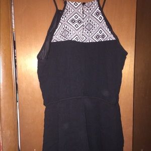 Black strappy romper with triple top